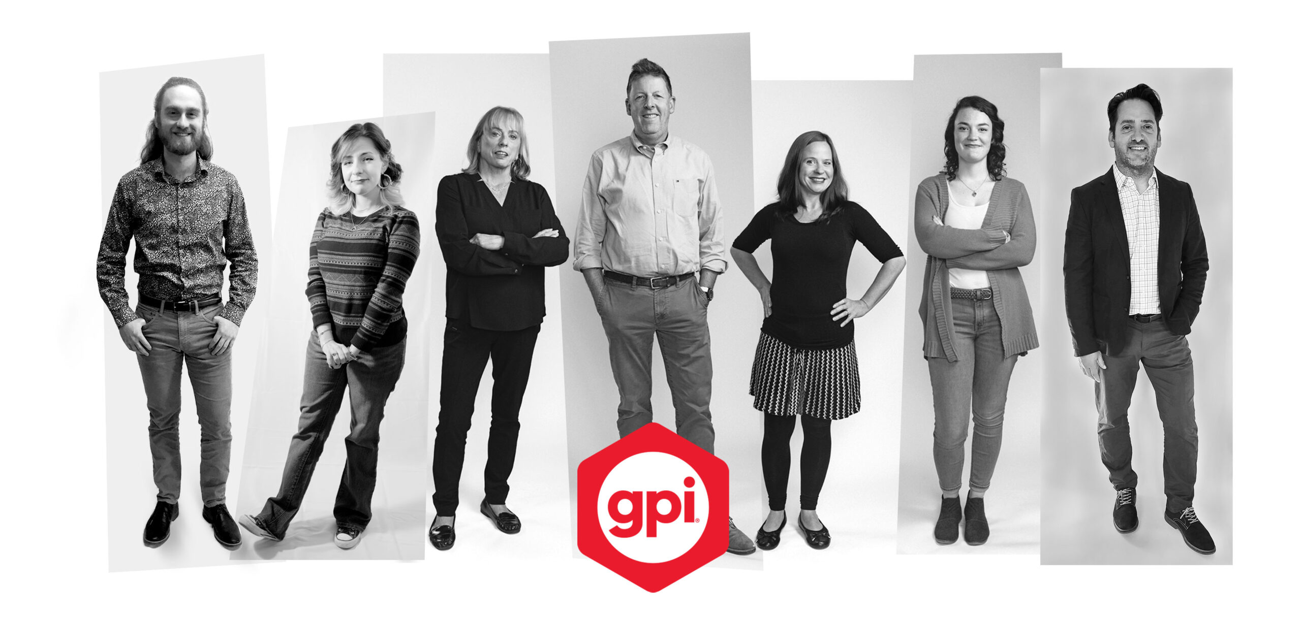 GPI Employees standing in black and white with GPI logo